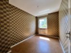 Charmantes Reihenhaus für die Familie in zentraler Lage und grüner Umgebung - Kleines Zimmer Obergeschoss