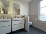 Komfortable 4-Zimmer-Wohnung mit großer Süd-/Westterrasse und zwei Garagenstellplätzen - Badezimmer